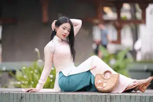 Graceful Vietnamese Lady in Traditional Ao Dai  1000024954-24