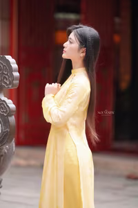VGU No.132: Elegant Yellow Ao Dai Beauty Inspiring Vietnamese Cultural Grace-0