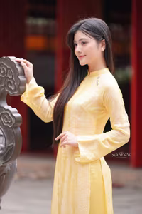 VGU No.132: Elegant Yellow Ao Dai Beauty Inspiring Vietnamese Cultural Grace-5