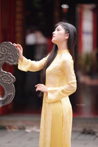 VGU No.132: Elegant Yellow Ao Dai Beauty Inspiring Vietnamese Cultural Grace-2