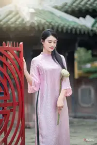 VGU No.163: The Graceful Beauty of a Vietnamese Girl in Traditional Pink Ao Dai Amidst Ancient Architecture-2