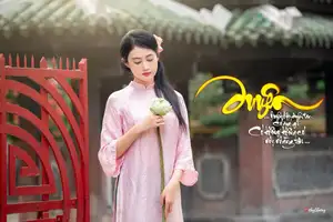 VGU No.163: The Graceful Beauty of a Vietnamese Girl in Traditional Pink Ao Dai Amidst Ancient Architecture-1