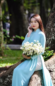 VGU No.113 Elegant Vietnamese Girl in Blue Ao Dai Captures Timeless Beauty Amidst Nature Serenity-5
