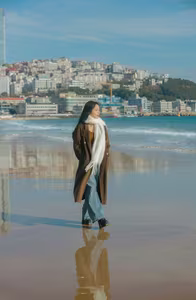 VGU No.81: Elegant Woman on a Winter Beach: A Pensive Moment of Style and Serenity.-6