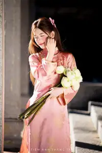 Captivating Serenity: Vietnamese Girl in Pink Ao Dai with Lotus Flowers1730591-15