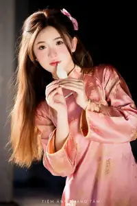 Captivating Serenity: Vietnamese Girl in Pink Ao Dai with Lotus Flowers1730591-11