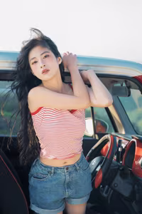 VGU No.128: Summer vibes: Young woman relaxed on a red car, captivating free spirit-0