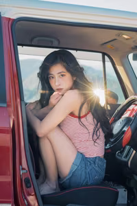 VGU No.128: Summer vibes: Young woman relaxed on a red car, captivating free spirit-5