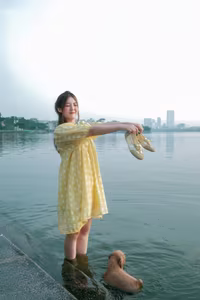 VGU No.135: Capturing Youthful Radiance: Girl in Yellow Dress Finds Serenity by the Lakeside.-0