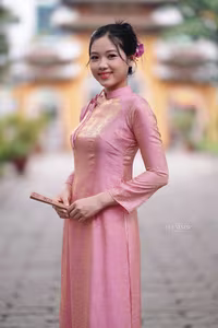 VGU No.136: The Graceful Pink Ao Dai: Vietnamese Beauty Embracing Tradition and Serenity-7