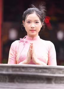 VGU No.136: The Graceful Pink Ao Dai: Vietnamese Beauty Embracing Tradition and Serenity-15