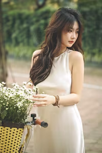 VGU No.54: Elegant Vietnamese Girl with White Chrysanthemums, A Gentle Moment by Bicycle Amidst Greenery.-2