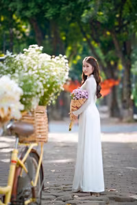 VGU No.103: Graceful Vietnamese Girl in Ao Dai Amidst Autumn Flowers-0
