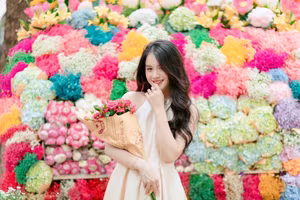 VGU No.133: Elegant Girl with a Radiant Smile Amidst a Colorful Floral Backdrop-1