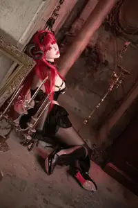 Coser Qie Qie Celia Transforms into Hindenburg: The Alluring Mystique of the Red-Haired Demoness in Unique Cosplay Photoshoot.-1