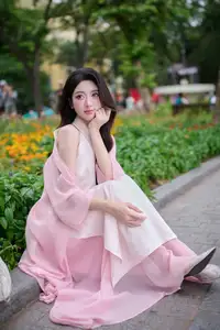 VGU No171: Vietnamese Beauty Graces a Flower Garden in Elegant Pink Ao Dai and Conical Hat-6