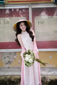 VGU No171: Vietnamese Beauty Graces a Flower Garden in Elegant Pink Ao Dai and Conical Hat-3