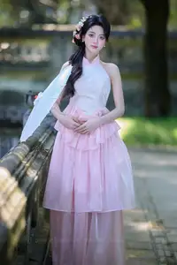 Discover the gentle charm of an Asian beauty in elegant attire, exuding grace and allure 1000025175-7