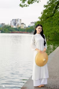 VGU No.77: Elegant Vietnamese Girl in White Ao Dai by Hanois Hoan Kiem Lake-0