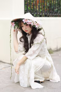 VGU No.143: Discover the Ethereal Beauty of a Vietnamese Girl in Ao Dai and Floral Conical Hat-6