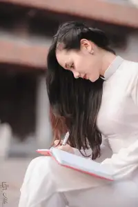 Graceful Vietnamese Girl in White Ao Dai, Radiant Smile at Ancient Site 1000026917-10