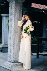 VGU No.131: Explore the Ethereal Beauty of a Vietnamese Lady in White Ao Dai with Lilies-8