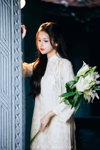 VGU No.131: Explore the Ethereal Beauty of a Vietnamese Lady in White Ao Dai with Lilies-9