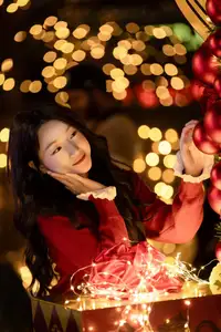 Radiant Smile Girl in Red Amidst Twinkling Lights: Warm Beauty for Festive Season-10