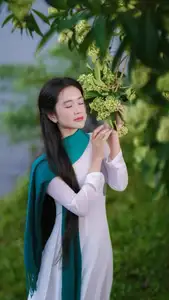 VGU No.172: Captivating Vietnamese Ao Dai Student in a Dreamy Moment, Showcasing Pure Grace Amidst Nature.-13