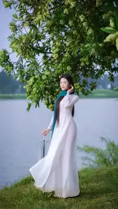 VGU No.172: Captivating Vietnamese Ao Dai Student in a Dreamy Moment, Showcasing Pure Grace Amidst Nature.-5