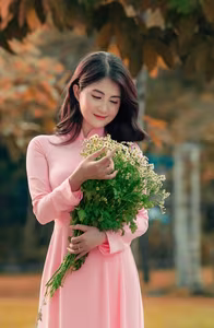 VGU No.20: Graceful Pink Ao Dai Muse Capturing Elegant Vietnamese Beauty Amidst Romantic Autumn Hues-0
