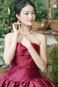 VGU No.187: Charming Woman in Red Dress Shines with Elegant Christmas Style. Discover Festive Fashion & Holiday Grace!-1