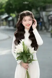 Vietnamese Schoolgirl Gracefully in Pure White Ao Dai Traditional Conical Hat and Lilies-9