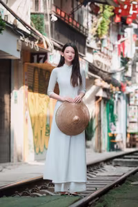 VGU No.79: Elegant Vietnamese Ao Dai Beauty on Hanoi Train Street-2
