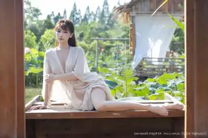 Discover Lu Xuan Xuan's Graceful Beauty in a White Dress Amidst a Serene Lotus Pond - XiuRen No.10630-2