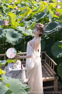 Discover Lu Xuan Xuan's Graceful Beauty in a White Dress Amidst a Serene Lotus Pond - XiuRen No.10630-37