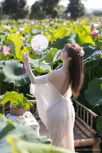 Discover Lu Xuan Xuan's Graceful Beauty in a White Dress Amidst a Serene Lotus Pond - XiuRen No.10630-32