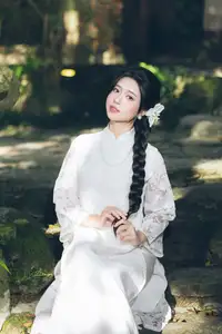 Charming Young Woman in White Lace & Orchids: Radiant Natural Beauty Amidst Greenery 1000026906-3