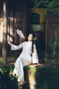 Charming Young Woman in White Lace & Orchids: Radiant Natural Beauty Amidst Greenery 1000026906-8