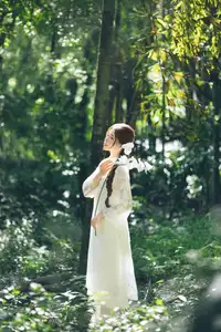 Charming Young Woman in White Lace & Orchids: Radiant Natural Beauty Amidst Greenery 1000026906-14